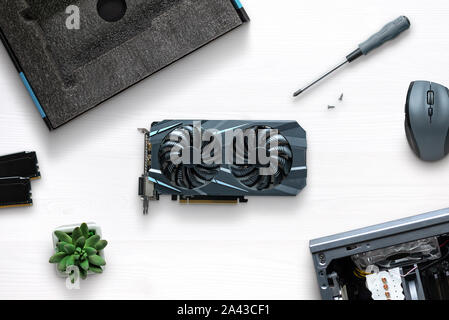 Gaming PC build concept with computer parts on desk. Stock Photo