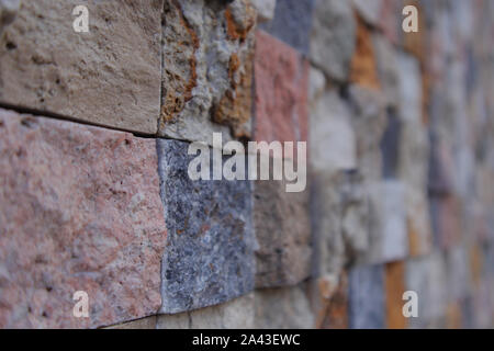 New Colored Wall Made From New Cutted Stone. Texture Pattern Structued Rough. Stock Photo