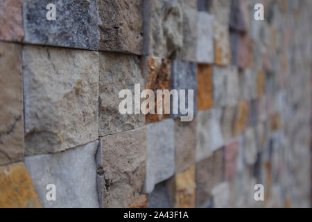 New Colored Wall Made From New Cutted Stone. Texture Pattern Structued Rough. Stock Photo