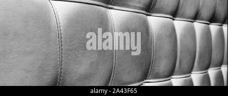 Tufted grey leather headboard texture, used for background Stock Photo