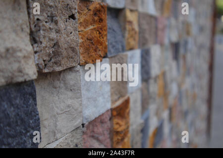 New Colored Wall Made From New Cutted Stone. Texture Pattern Structued Rough. Stock Photo