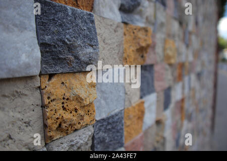 New Colored Wall Made From New Cutted Stone. Texture Pattern Structued Rough. Stock Photo
