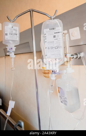 Valencia, Spain - September 10, 2019: Saline drippers hung in a hospital Stock Photo