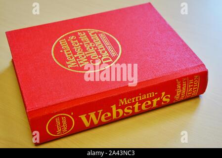 PRINCETON, NJ -11 OCT 2019- View of a Merriam Websters English dictionary with a red cover on a desk. Stock Photo