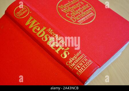 PRINCETON, NJ -11 OCT 2019- View of a Merriam Websters English dictionary with a red cover on a desk. Stock Photo