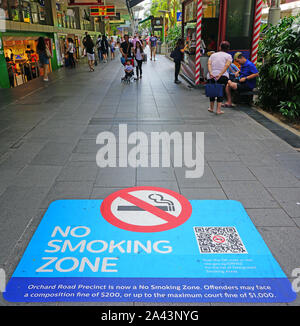 SINGAPORE -23 AUG 2019- View of a No Smoking sign on the street on Orchard Road in Singapore. Stock Photo