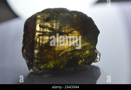 Axinite is among the rare-earth minerals, popular among collectors for its beauty of exotic colors, locality, Pakistan. Stock Photo