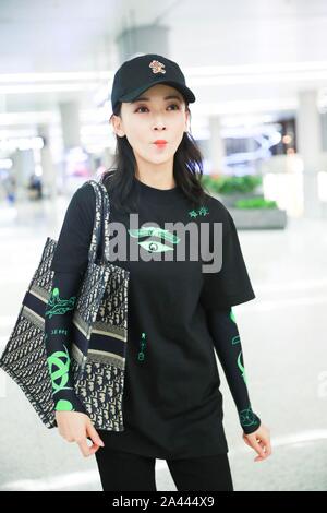 Chinese actress Wu Jiyan appears at an airport in Shanghai, China, 29 August 2019. Undershirt: Marine Serre Shorts: Rta Boots: Timberland Bag: Dior ** Stock Photo