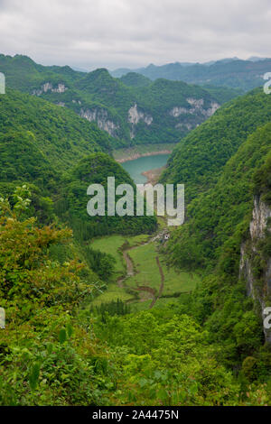 View of the mountains in which Liu Chaoxian looks after 567 coffins of late clansmen in in Qibo village, Pingba county, Anshun city, southwest China's Stock Photo
