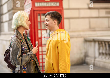 Happy couple by westminster bridge, River Thames, London. UK. Stock Photo