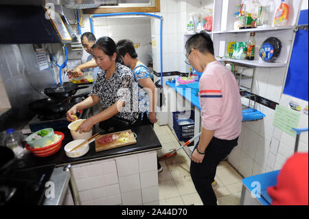 Families Are Cooking In The Shared Kitchen Set Up By First Year Graduate Student Wangrui Next To The Medical Department Of Wuhan University In Wuhan Stock Photo Alamy