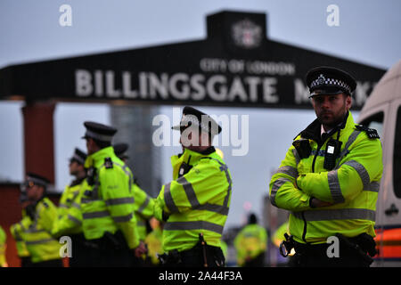 Animal Rebellion activists protest at Billingsgate Fish Market in Poplar, London. Stock Photo