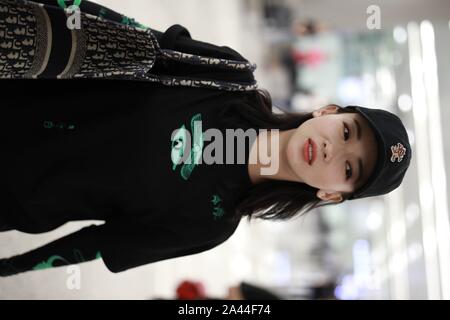 Chinese actress Wu Jiyan appears at an airport in Shanghai, China, 29 August 2019.   Undershirt: Marine Serre  Shorts: Rta  Boots: Timberland  Bag: Di Stock Photo