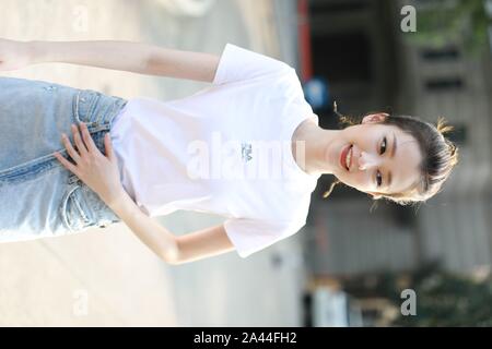 Chinese actress Qiao Xin, also known as Bridgette Qiao, poses before attending a press conference to release Huawei x Gentle Monster smart glasses in Stock Photo