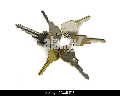 top view bunch of old vintage different keys isolated on white background. Safety and security concept Stock Photo