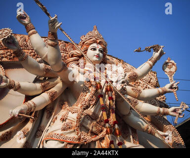 Idol of Hindu Goddess Durga during the Durga Puja festival which happens in India every year Stock Photo