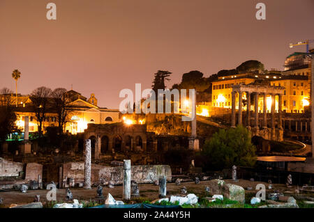 Eight columns of the Temple of Saturn, built in 497 BC in the Roman Forum of  Rome, Italy. Stock Photo