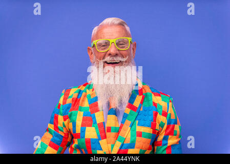 Senior man with eccentric look - Youthful hipster man with beard portrait Stock Photo