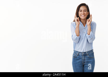 Girl have feeling luck good fortune. Optimistic adult woman with tattoo close eyes, smiling broadly, anticipating dream come true, miracle, positive r Stock Photo