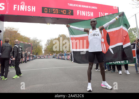 Vienna, Austria. 12th Oct, 2019. Kenya's Eliud Kipchoge celebrates at the finish line after the match of '1:59 challenge' in Vienna, Austria, on Oct. 12, 2019. Eliud Kipchoge completed the '1:59 challenge' successfully in 1h 59m 40.2s. Credit: Guo Chen/Xinhua/Alamy Live News Stock Photo