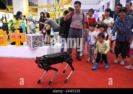 A four-legged robot dog called 'Laikago' developed by Unitree is displayed during the 2019 Word Robot Conference (WRC) in Beijing, China, 20 August 20 Stock Photo