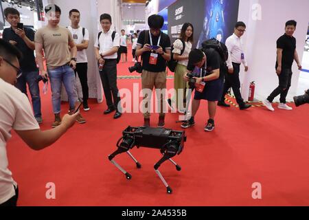 A four-legged robot dog called 'Laikago' developed by Unitree is displayed during the 2019 Word Robot Conference (WRC) in Beijing, China, 20 August 20 Stock Photo