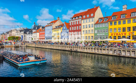 COPENHAGEN, DENMARK - SEPTEMBER 21, 2019: Copenhagen waterfront, canal and entertainment district lined by brightly colored 17th and 18th century town Stock Photo