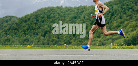 men runner running mountain marathon. concept of copy space Stock Photo