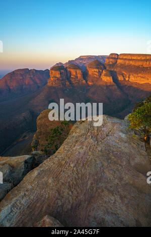 view of three rondavels and the blyde river canyon at sunset in south africa Stock Photo