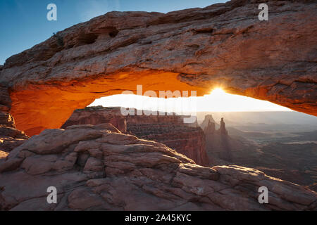 View through Mesa Arch in the Island in the Sky unit of Canyonlands National Park, Utah, USA Stock Photo