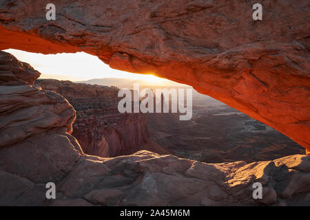 View through Mesa Arch in the Island in the Sky unit of Canyonlands National Park, Utah, USA Stock Photo