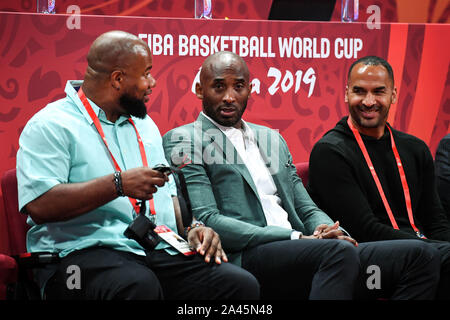 Former American NBA player Kobe Bryant, middle, shows up at the Spain vs Australia 2019 FIBA Basketball World Cup in Beijing, China, 13 September 2019 Stock Photo