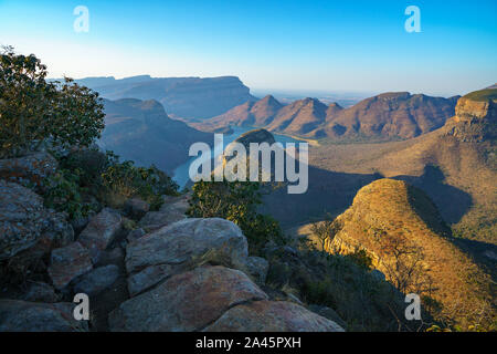 view of three rondavels and the blyde river canyon at sunset in south africa Stock Photo