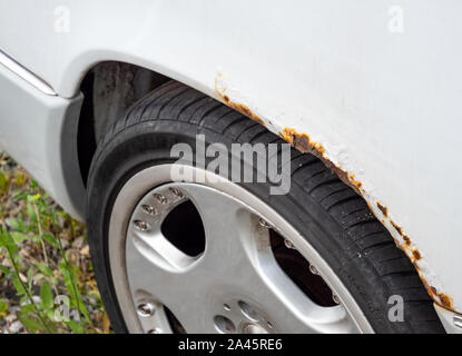 Rust on fender car repair Stock Photo