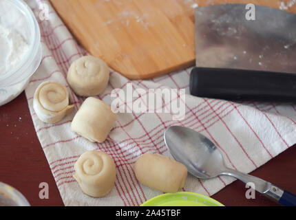 Homemade bread rolls with butter on table Stock Photo