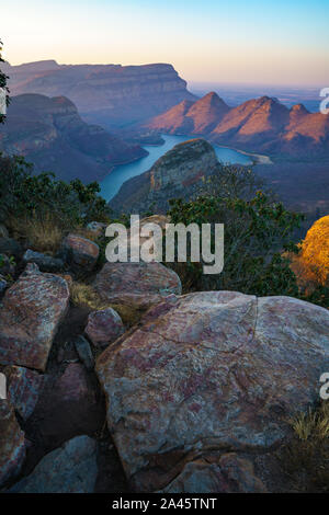 view of three rondavels and the blyde river canyon at sunset in south africa Stock Photo