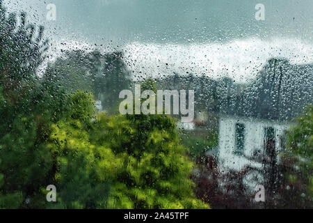 Rainy day - Rain on window. Stock Photo