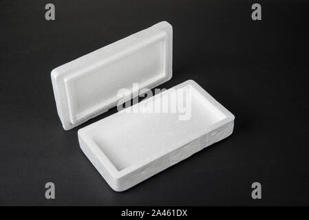 Polystyrene box on a black background for smartphone Stock Photo