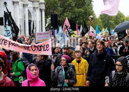 Oxford Street, London, UK. 12th october 2019. Extinction Rebellion stage an Extinction March 'There is Strength in Grief' along Oxford Street. Credit: Matthew Chattle/Alamy Live News Stock Photo