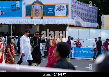 Celebrities like Nusrat Jahan, Nikhil Jain, Abhijeet bhattacharya, sujit bose are marching or walking though red road at puja carnival in Kolkata orga Stock Photo