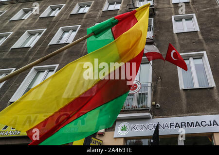 Gdansk, Poland. 12th, October 2019 Protesters with Kurdish flag (Flag of the PYD for Rojava) in front of Turkish Consulate are seen in Gdansk, Poland on 12 October 2019  People protest against Turkey's military invasion in Syria.  © Vadim Pacajev / Alamy Live News Stock Photo