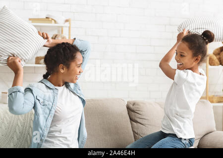 Two adorable girls having fun at home Stock Photo