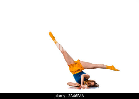 Amazing dancer is doing breakdance on a white background Stock Photo