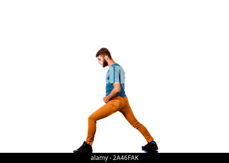 An urban guy is doing breakdance in the studio Stock Photo