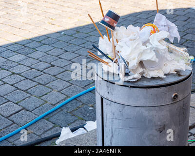full Dustbin in a city Stock Photo