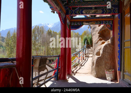 Ancient traditional corridor interior of Thousand Buddha Caves in Mati Temple, Zhangye Gansu China.