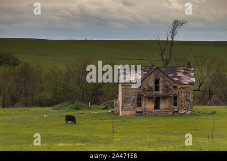 Old Rustic Farmhouse in the Flinthills of Kansas. Stock Photo