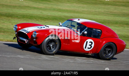 1963 AC Cobra Le Mans coupe with driver Karun Chandok during the RAC TT Celebration race at the 2019 Goodwood Revival, Sussex, UK. Stock Photo