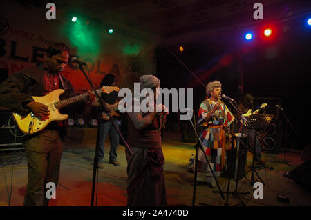 Paban Das Baul performs on a stage. He is known for pioneering traditional Baul music on the international music scene and for establishing a genre of Stock Photo