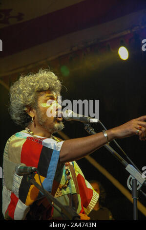 Paban Das Baul performs on a stage. He is known for pioneering traditional Baul music on the international music scene and for establishing a genre of Stock Photo